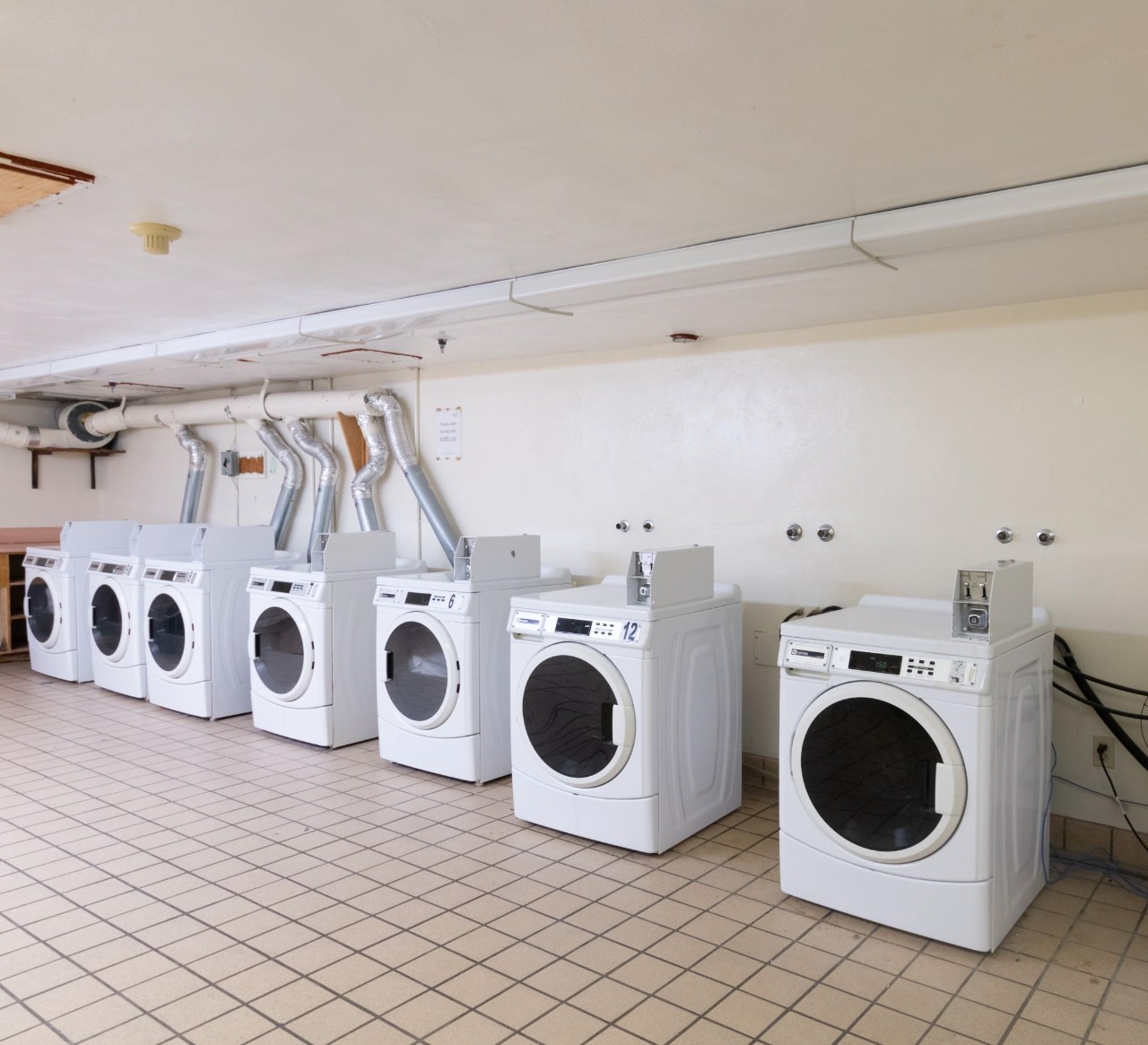 Common laundry facilities have several coin-operated washers and dryers