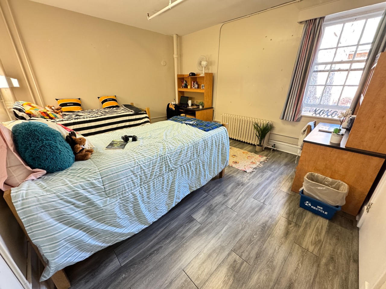 This double room has plenty of space for both students, with two desks, closets, and beds. 