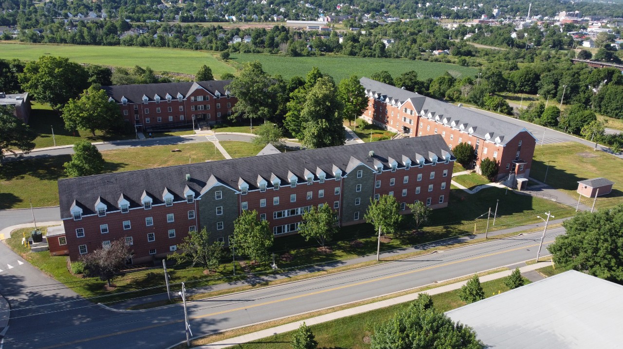 The Truro residence buildings as seen from the an aerial view on the opposite side of the road.