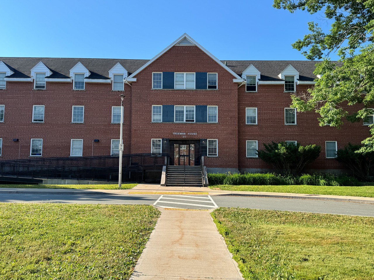 The red brick front of Trueman House as seen from the Horseshoe.
