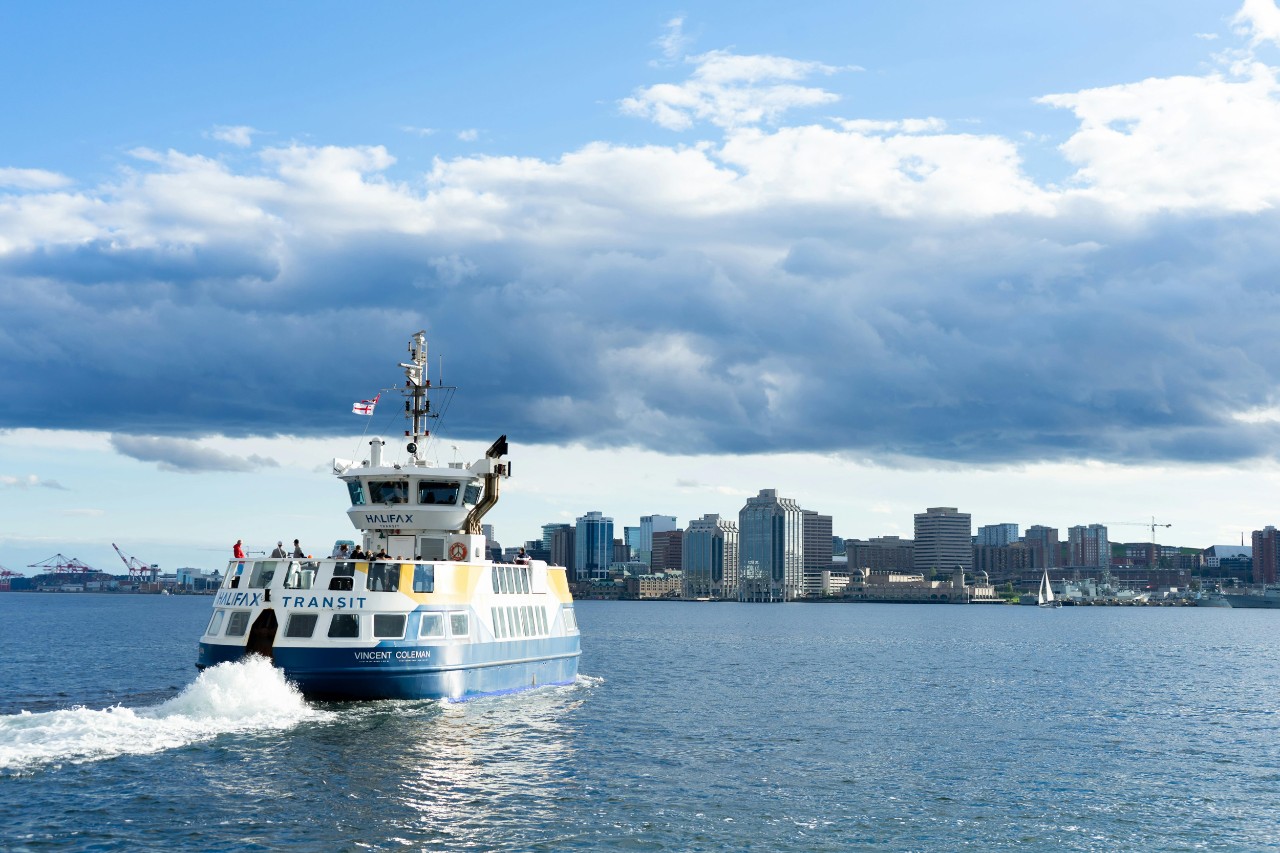 One of the Halifax ferries crosses the harbour toward the Halifax waterfront
