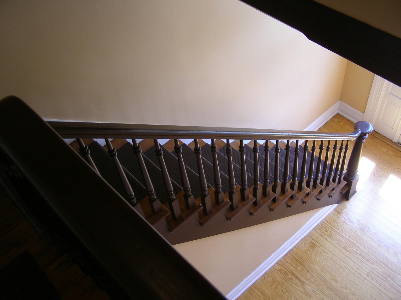 A wooden stairwell in an apartment building