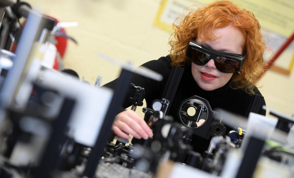 Dr. Kimberley Hall uses an ultrafast laser in her lab. (Danny Abriel photo)