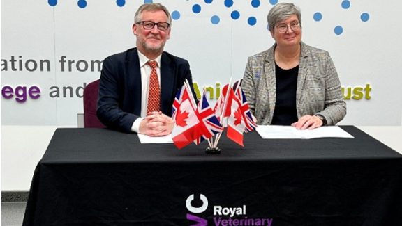 RVC President and Principal Dr. Stuart Reid and Dr. Heather Bruce sign the MOU in London.