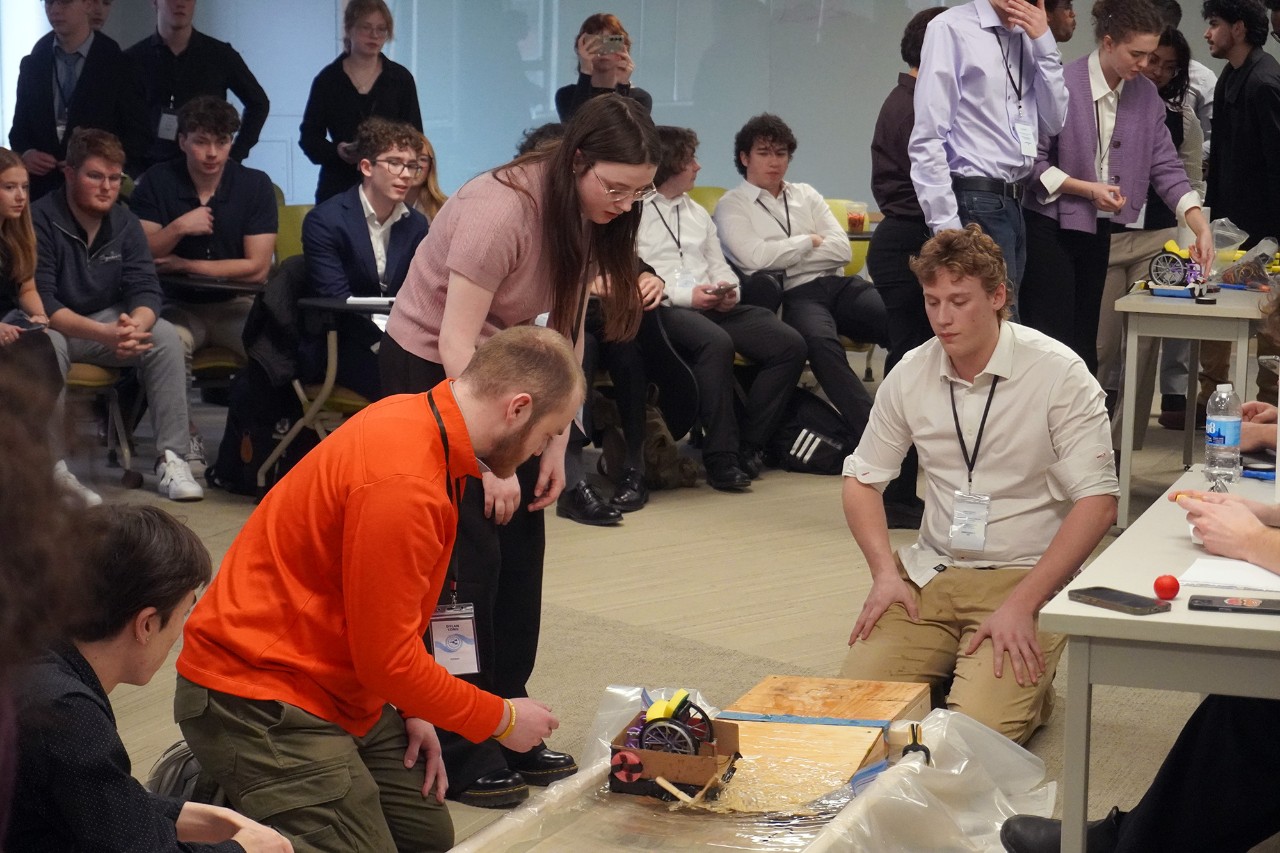 students at a robotics competition
