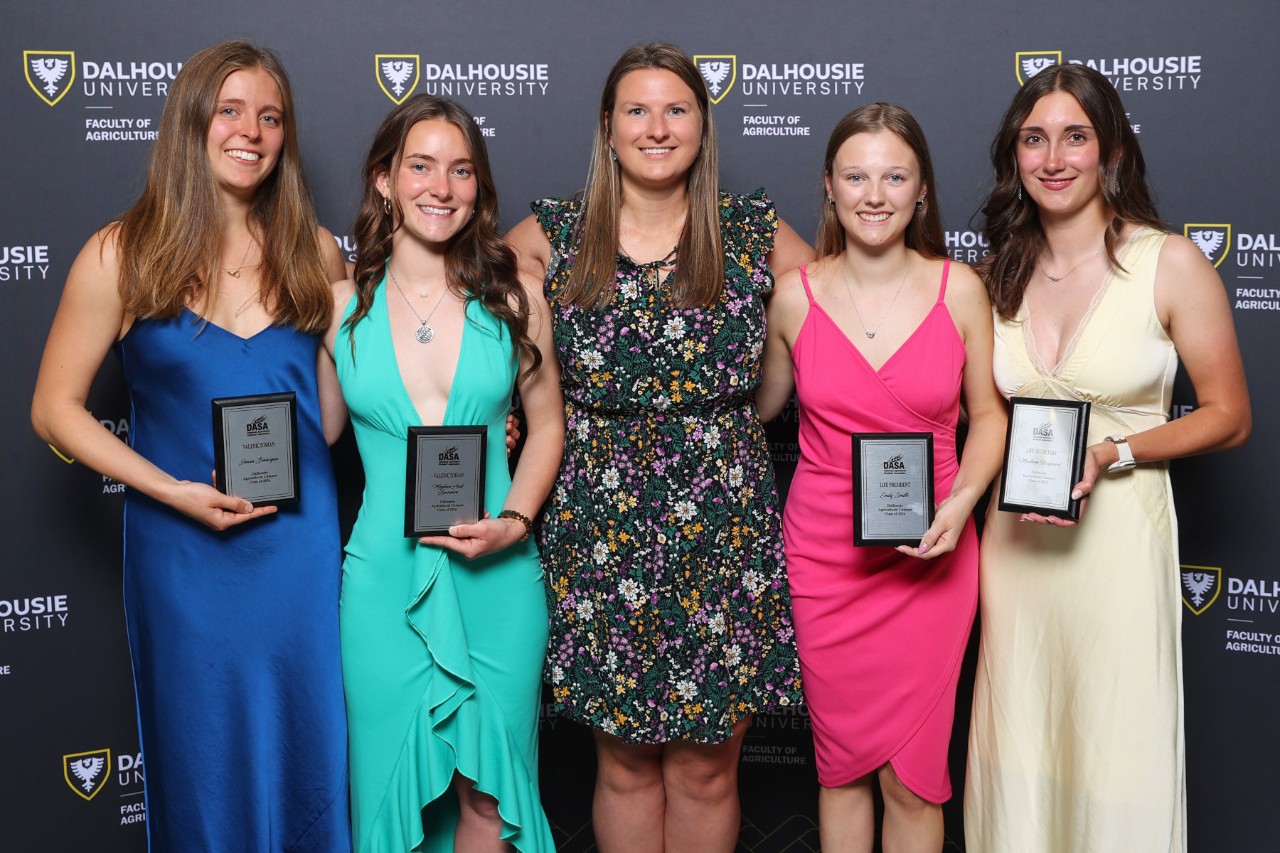 Students standing with their awards
