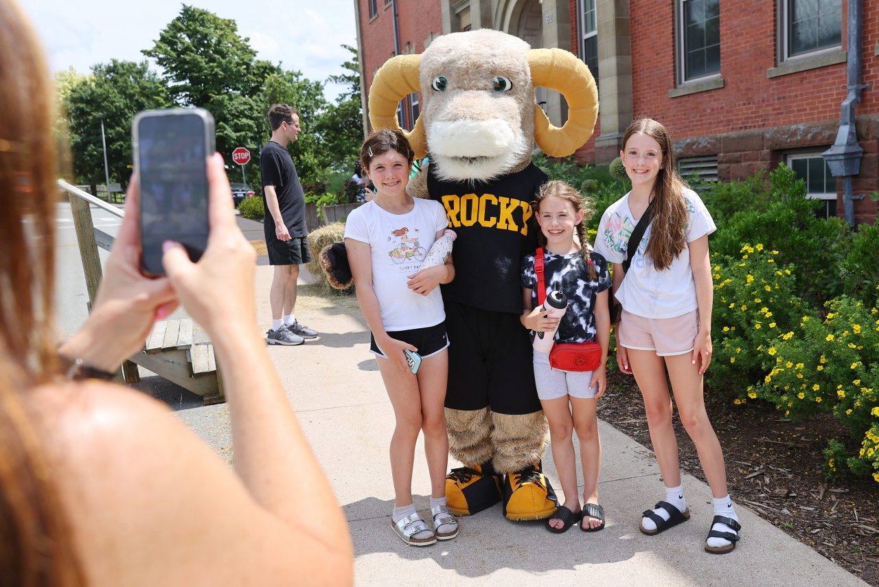 Kids pose with Rocky the Ram mascot