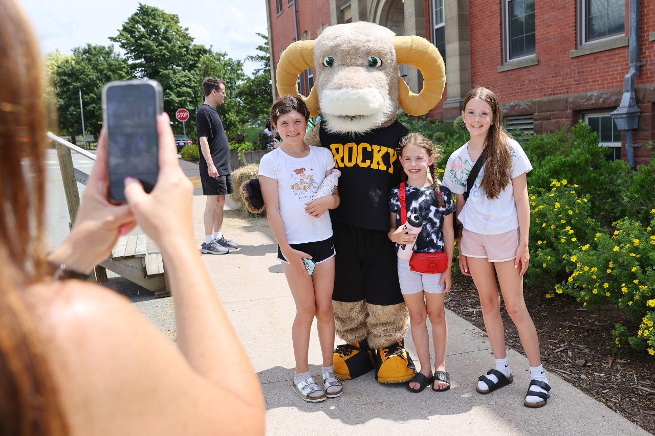 Kids pose with Rocky the Ram mascot