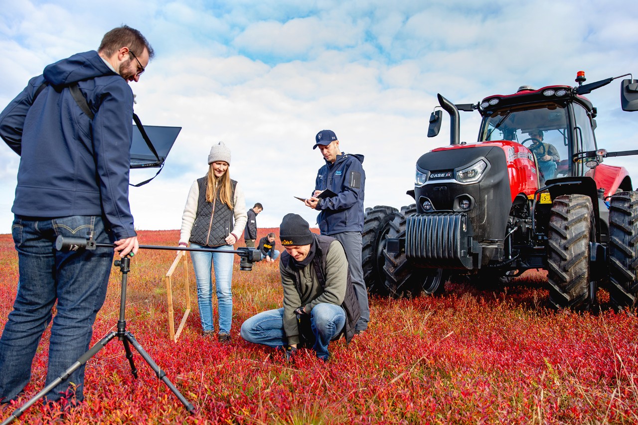 Students working at computers at various desks