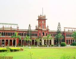 Red brick building in the Indian style, with a central tower.