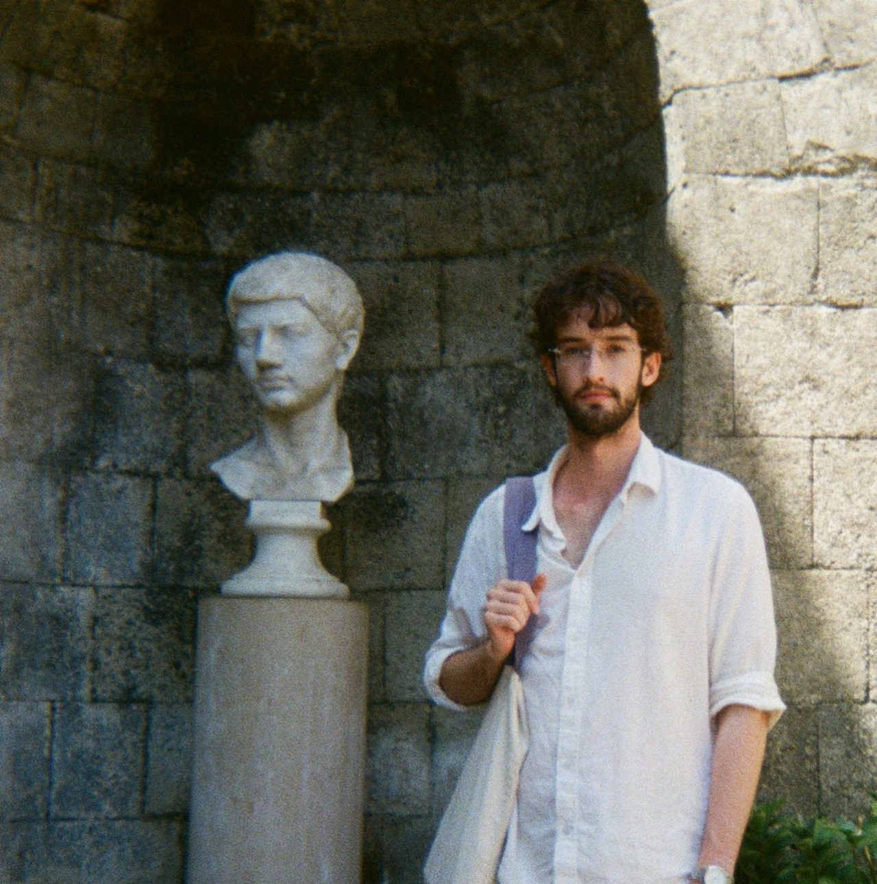 Angus Wilson with bust of Virgil 